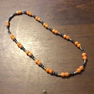 004 Vintage orange/black/gold bead necklace- 20”